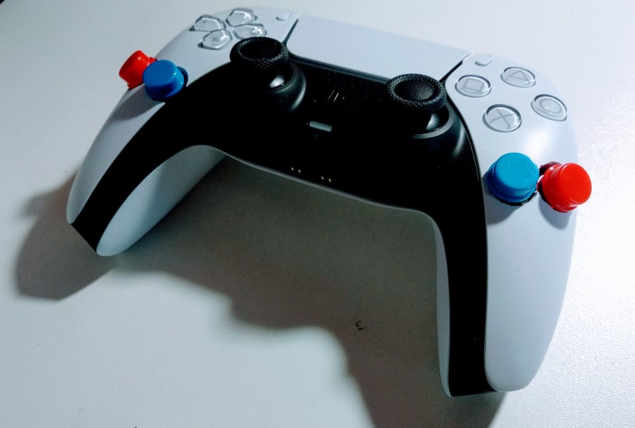 PS5 Dualsense controller with triggers on it