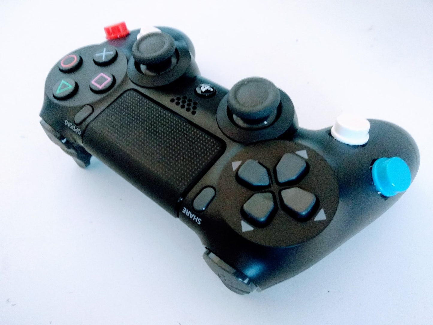 Manette PS4 gachettes dessus