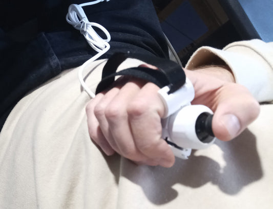 Mini USB mouse in hand