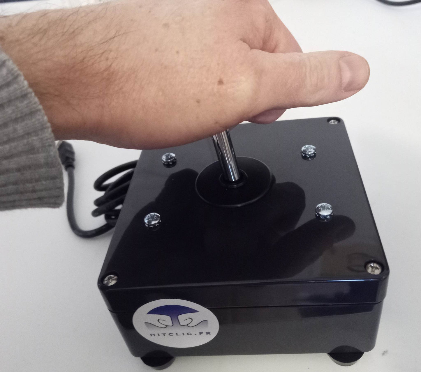 Arcade joystick with ball