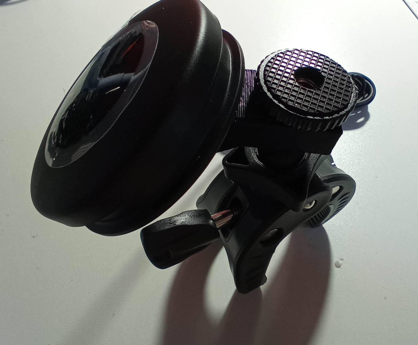Fixing clamp for Logitech switch