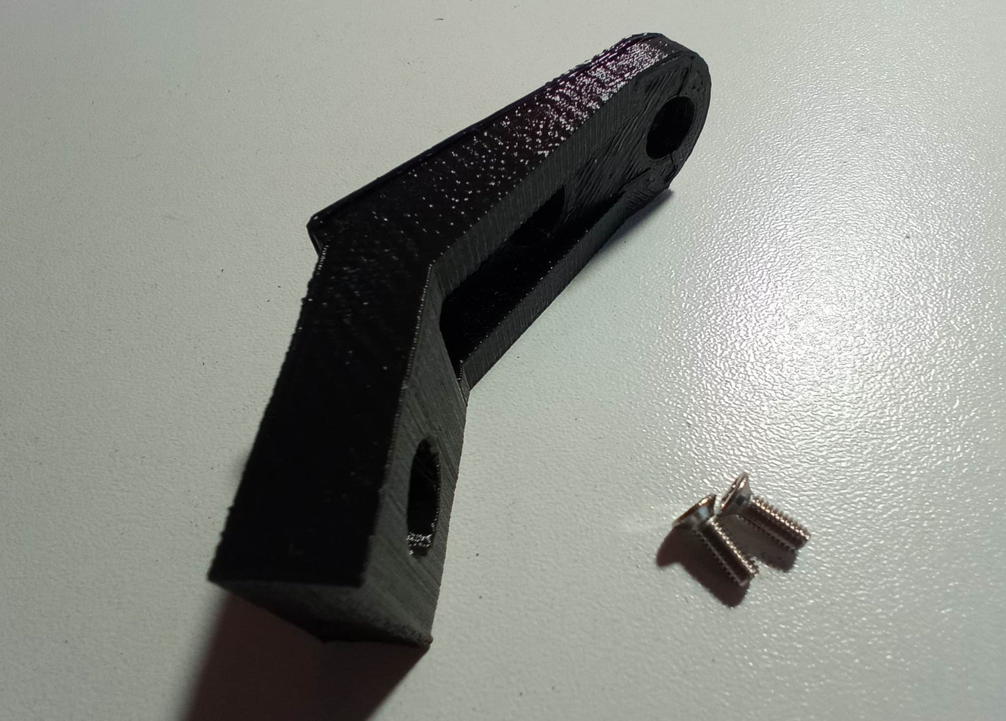 Fixing clamp for Logitech switch
