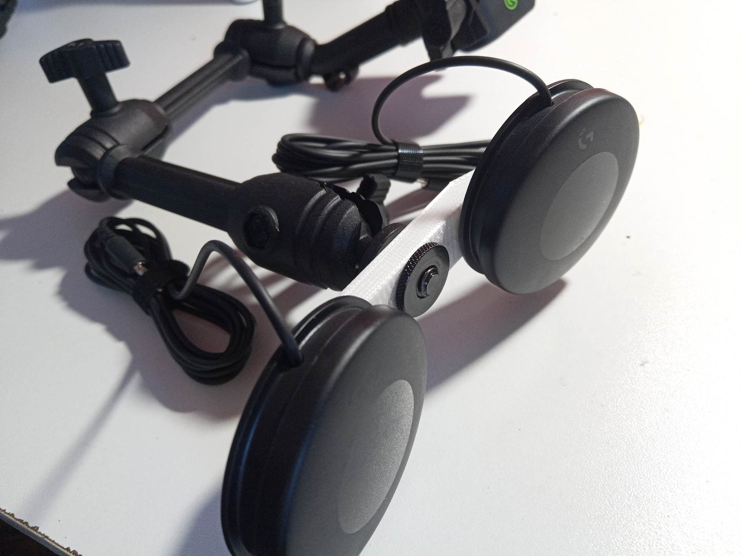 Double mounting arm for Logitech switch