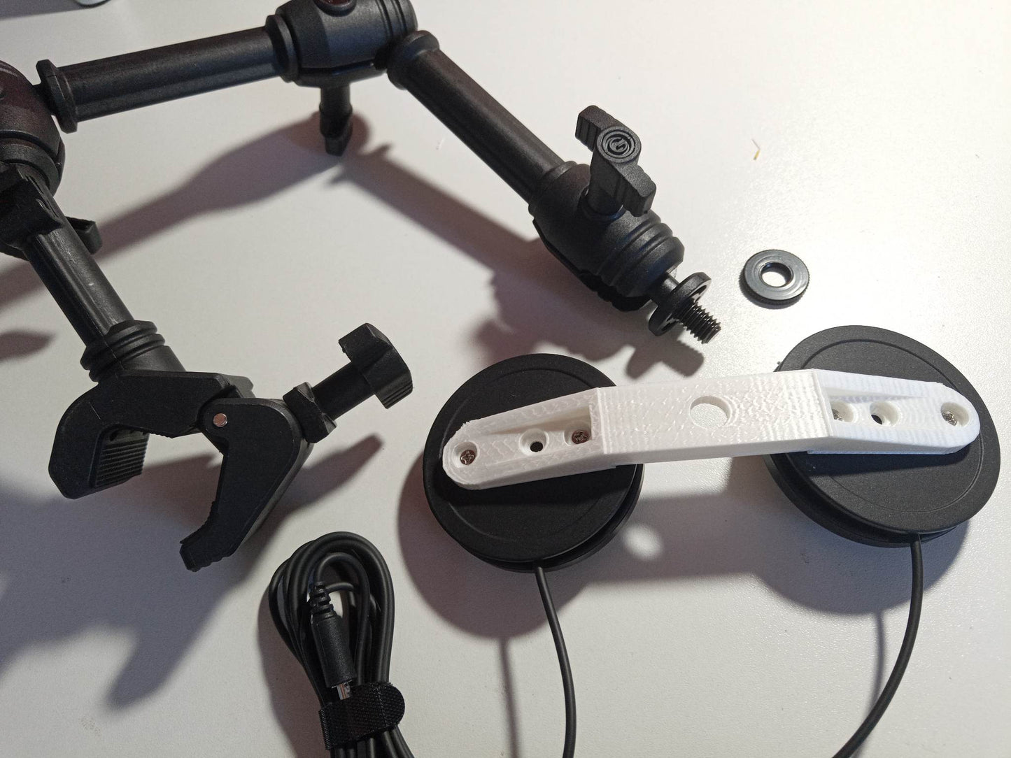 Double mounting arm for Logitech switch