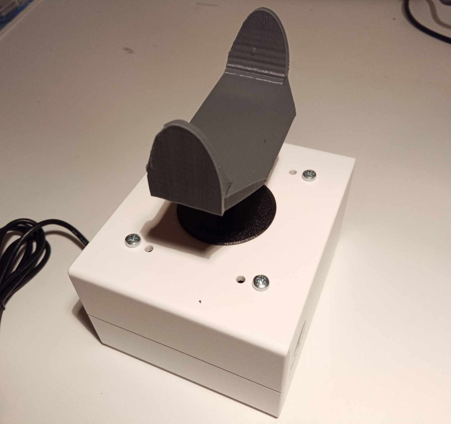 Arcade joystick with ball