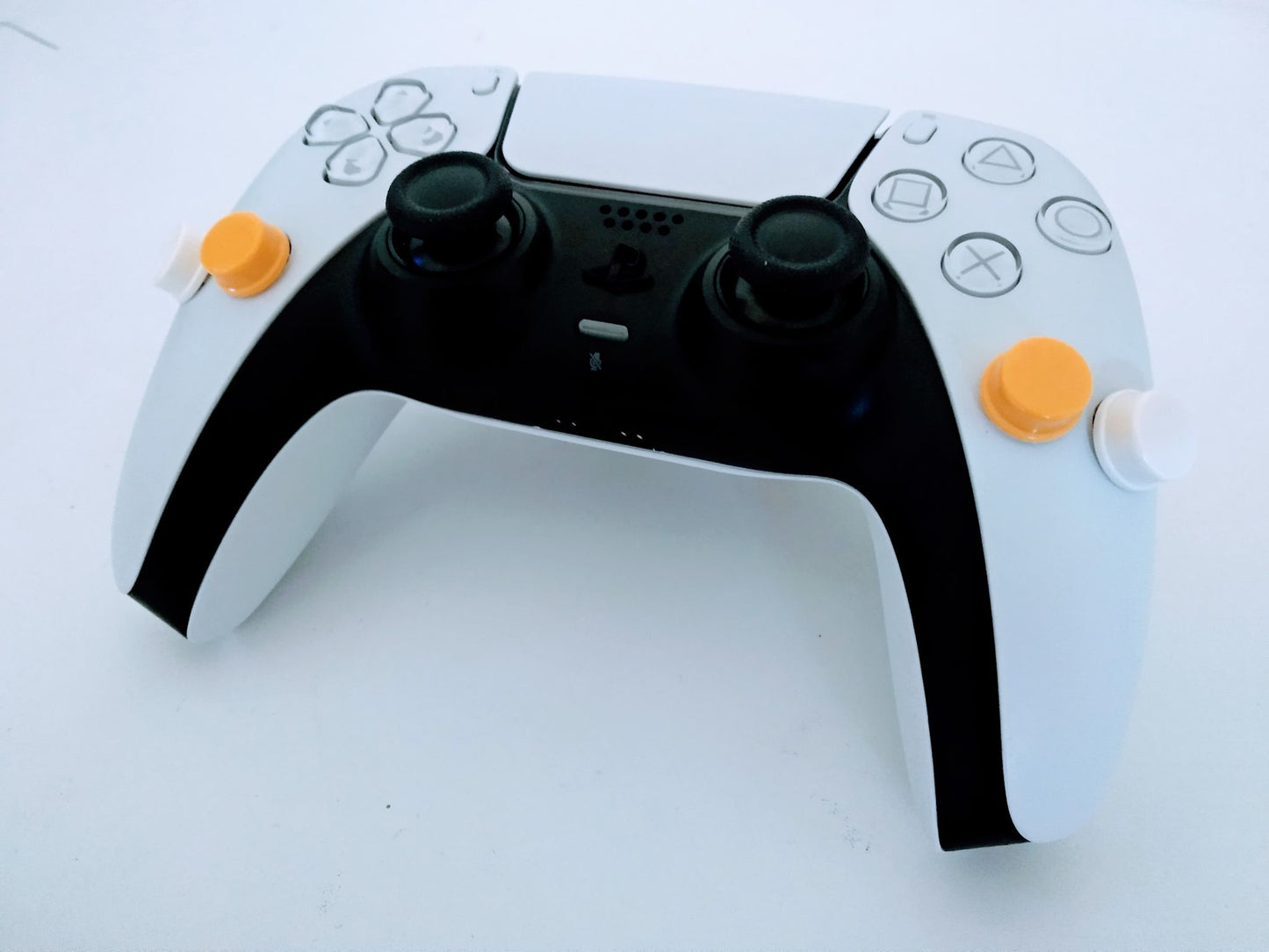 PS5 Dualsense controller with triggers on it