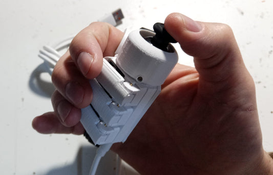 Mini USB mouse in hand