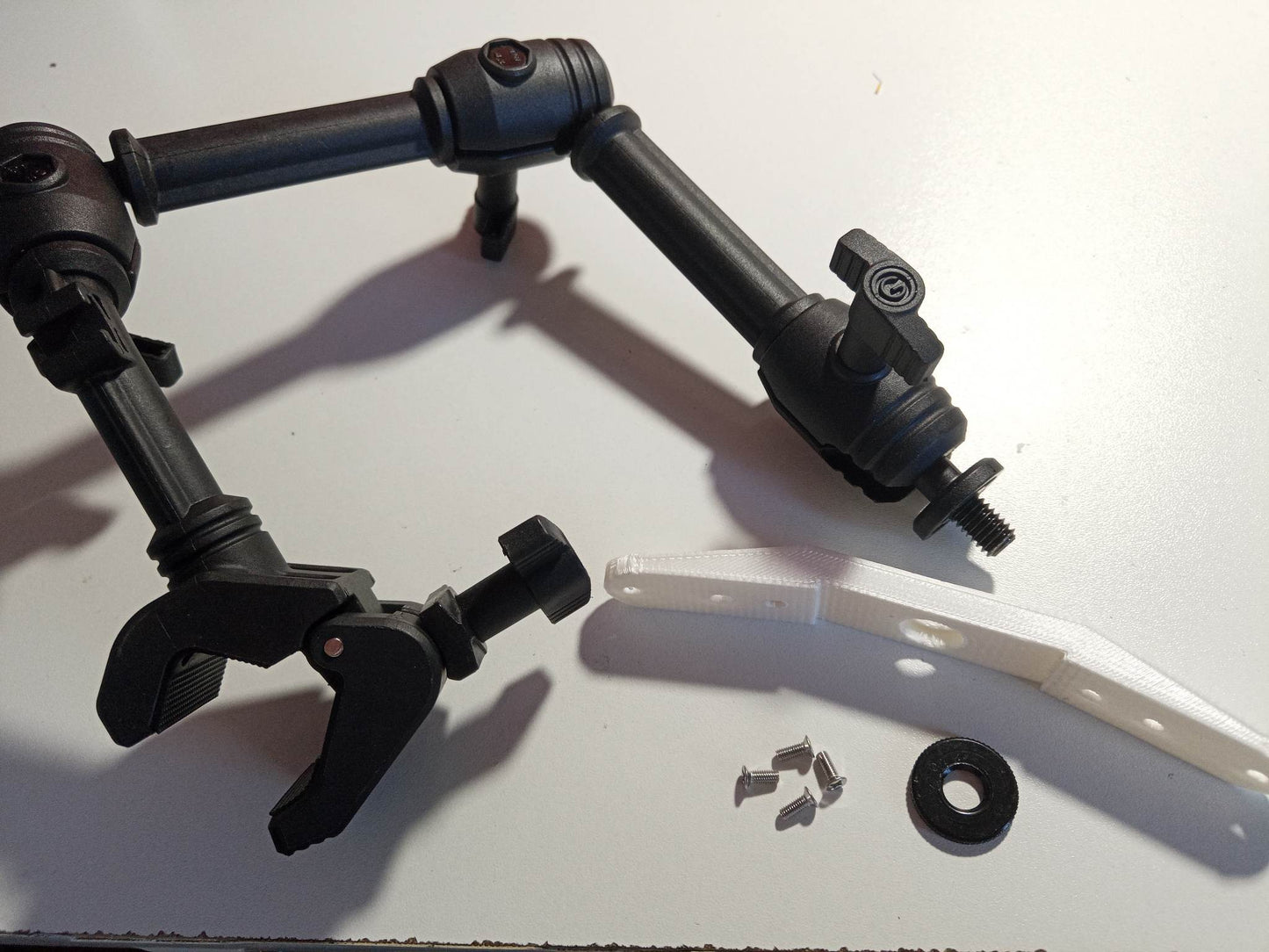 Double mounting arm for Logitech switch