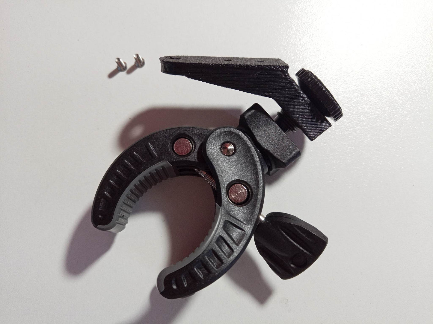 Fixing clamp for Logitech switch