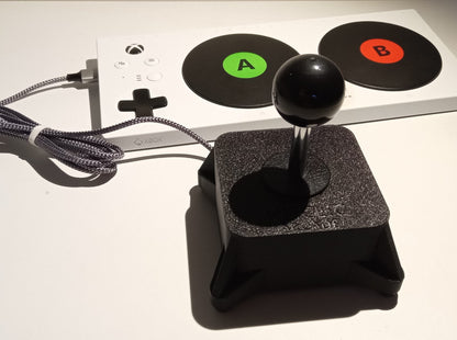 Arcade joystick with ball